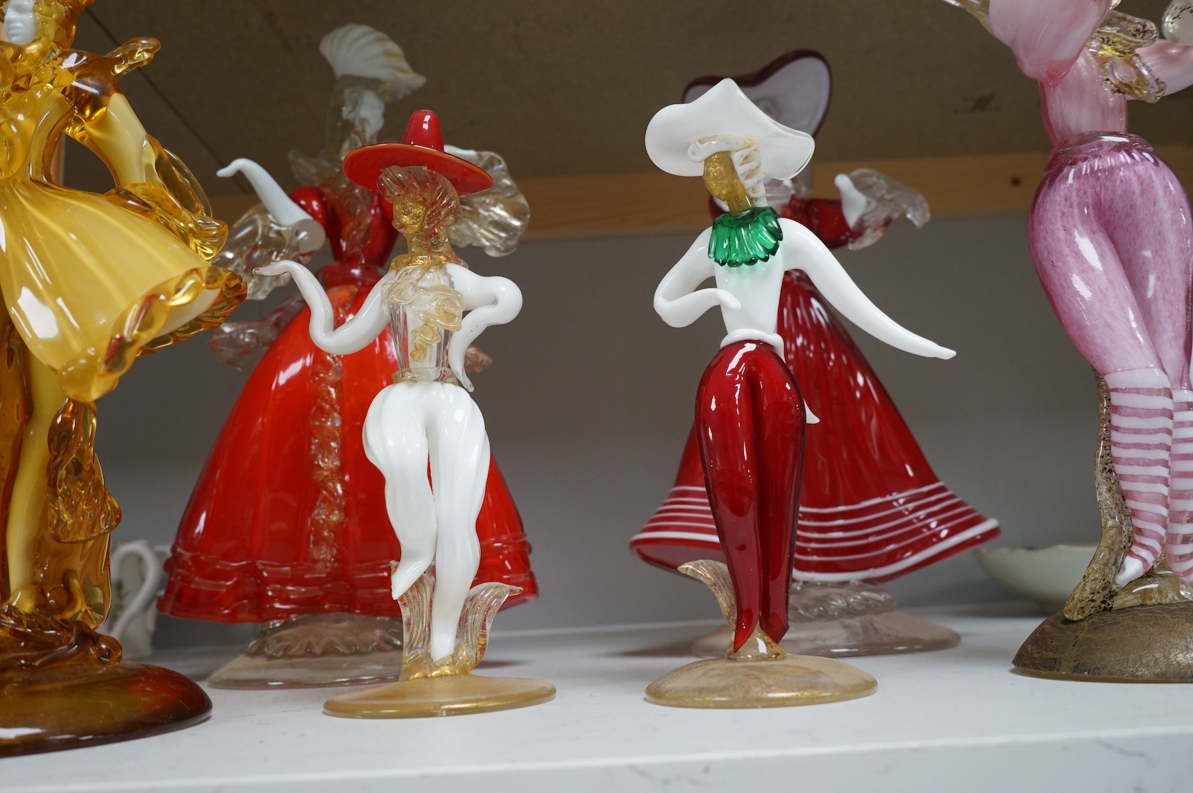 Six Murano glass dancing figures, largest 32cm